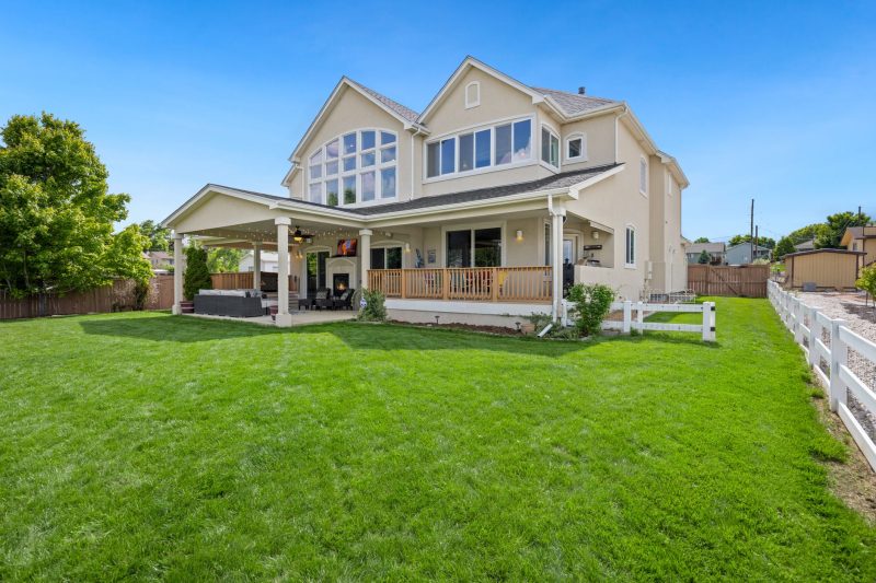 Home 9 Beautiful twostory suburban house with a large green lawn an 1783443846
